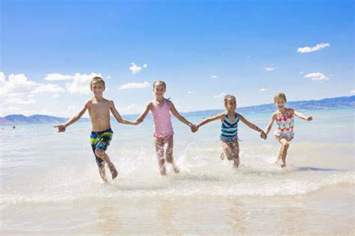 Children playing on the beach in Chile.