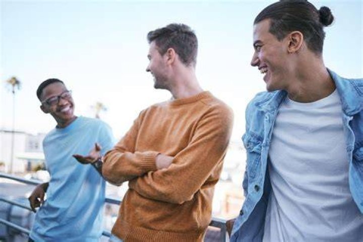 Happy men in a conversation happy men in a conversation