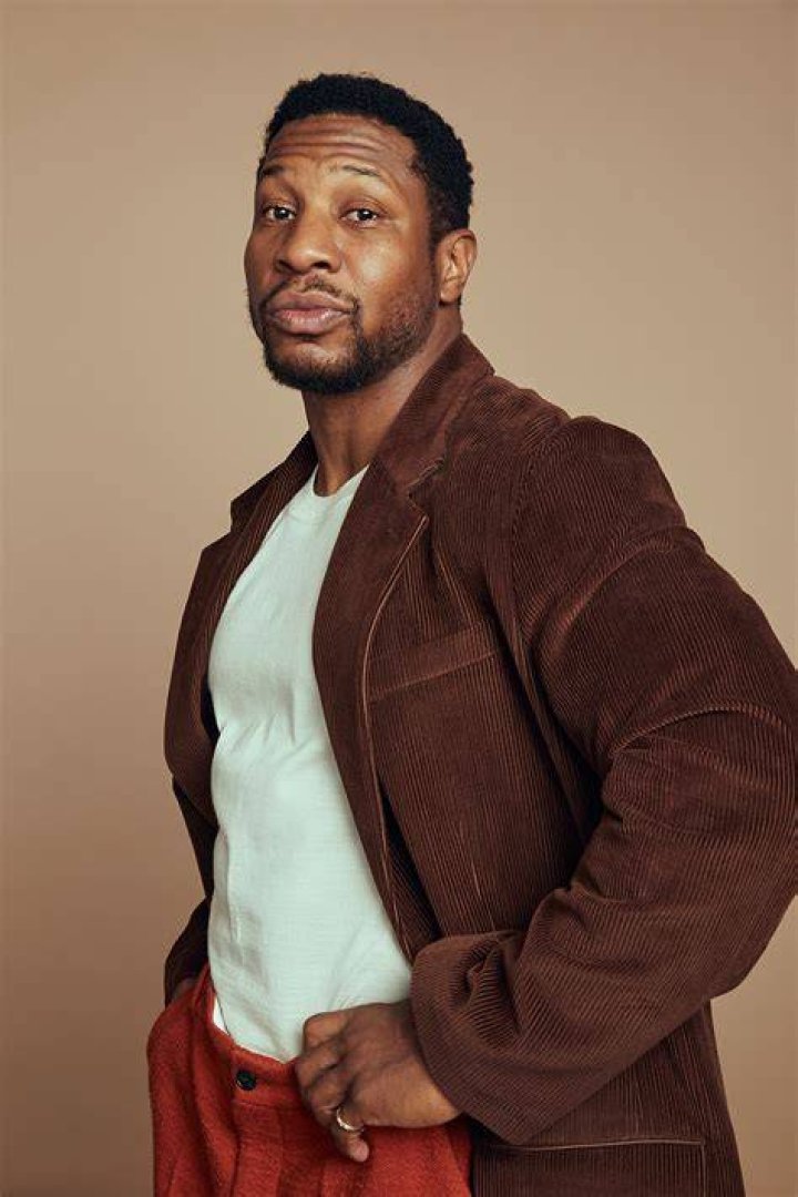 jonathan majors laying by the pool jonathan majors
