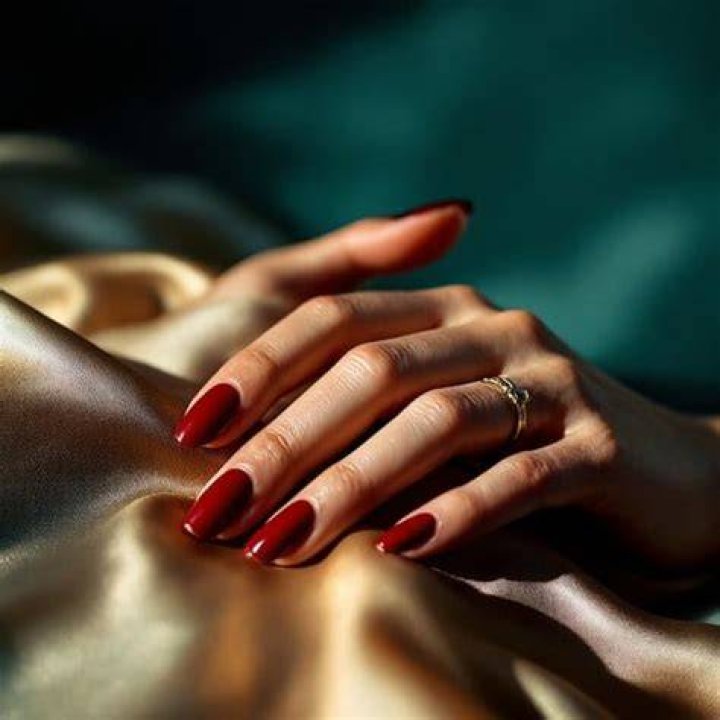 Perfect red manicure with champagne bottle Perfect red manicure with champagne bottle