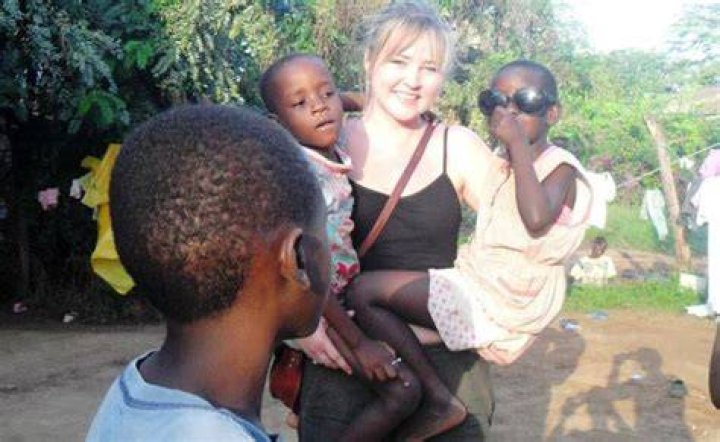 Volunteer with children in Nakuru, Kenya