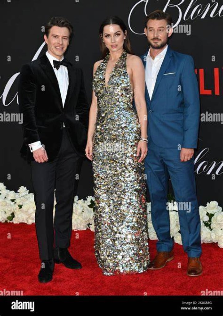 xavier samuel, ana de armas and evan williams in blonde
